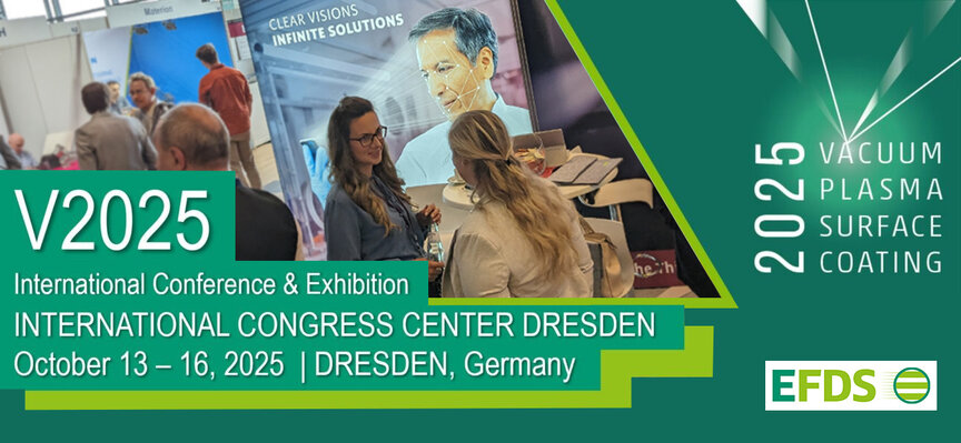 Exhibition booth at V2025 with two female visitors in conversation in front of a display – conference atmosphere at the International Congress Center Dresden.
